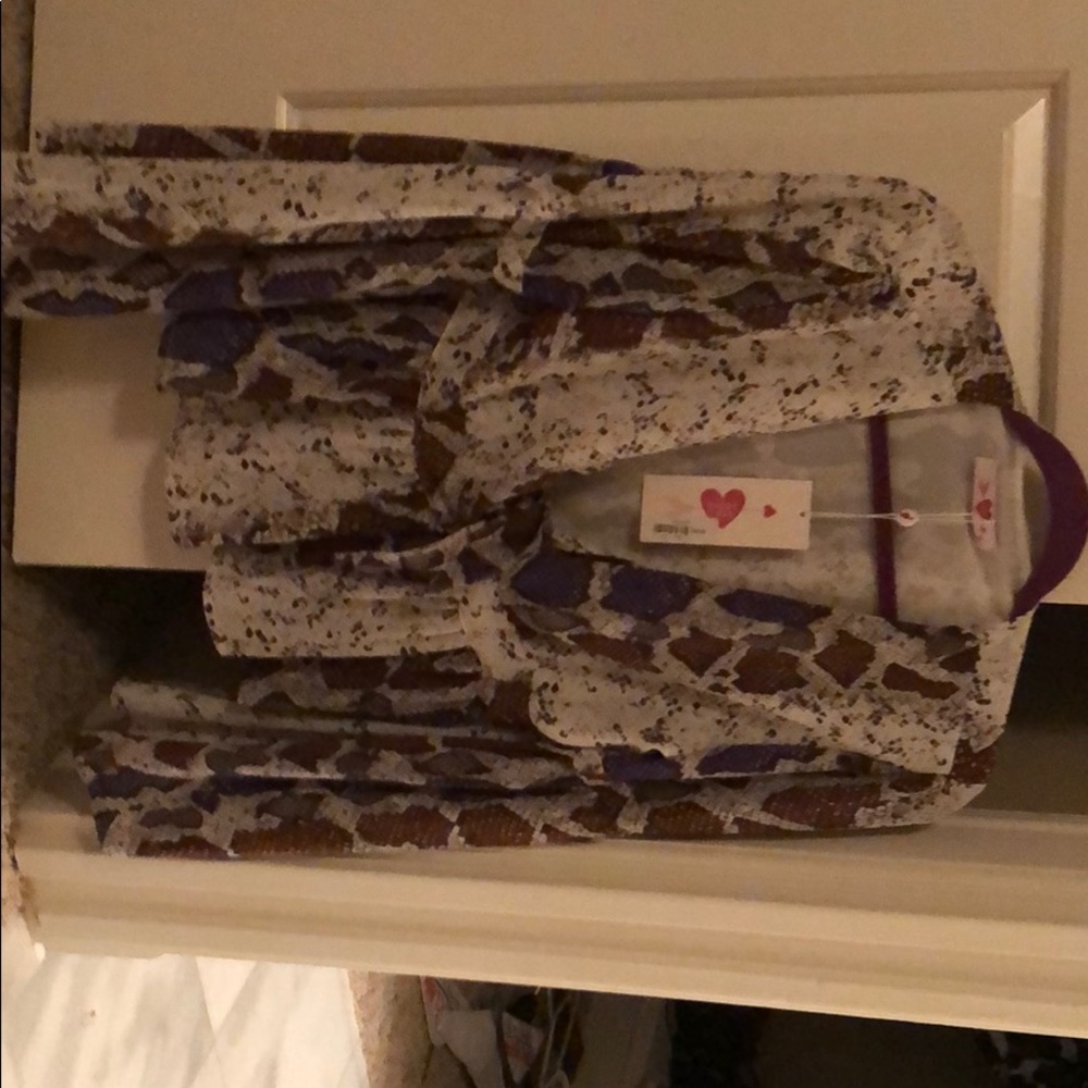 Buddy Love top. Brand new with tags. Size medium.